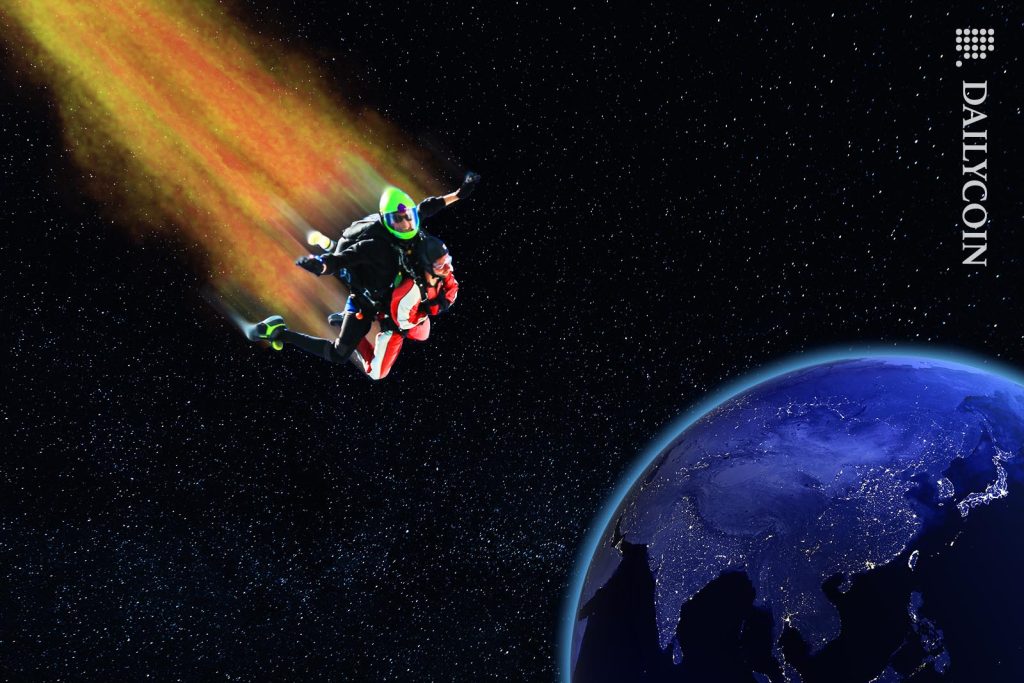 Two man skydiving into Asia from space leaving a tail of fire behind.